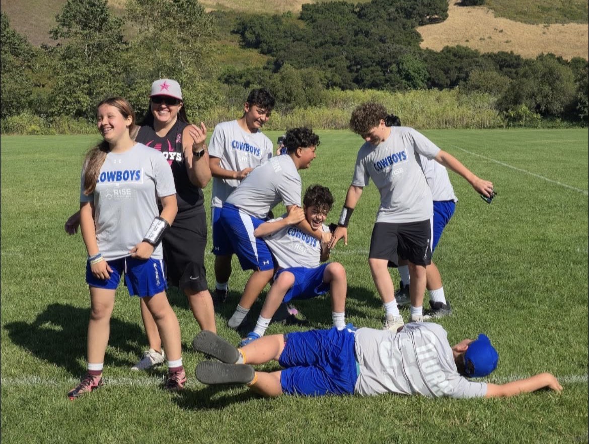 Cowboys team celebrating after a win