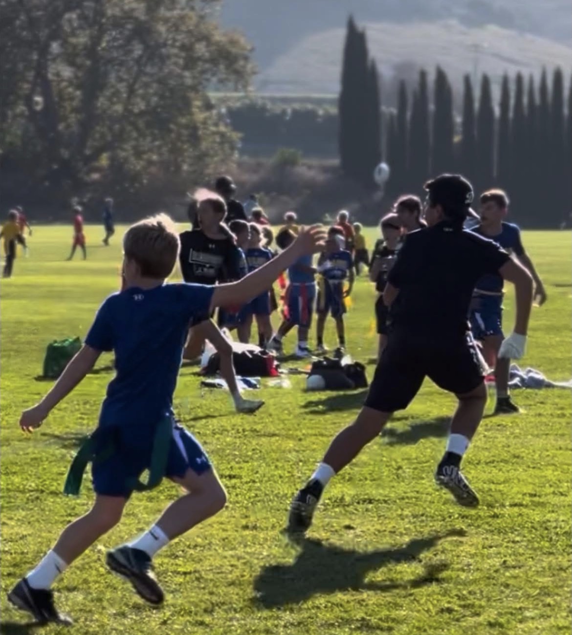 Quarterback firing a throw downfield