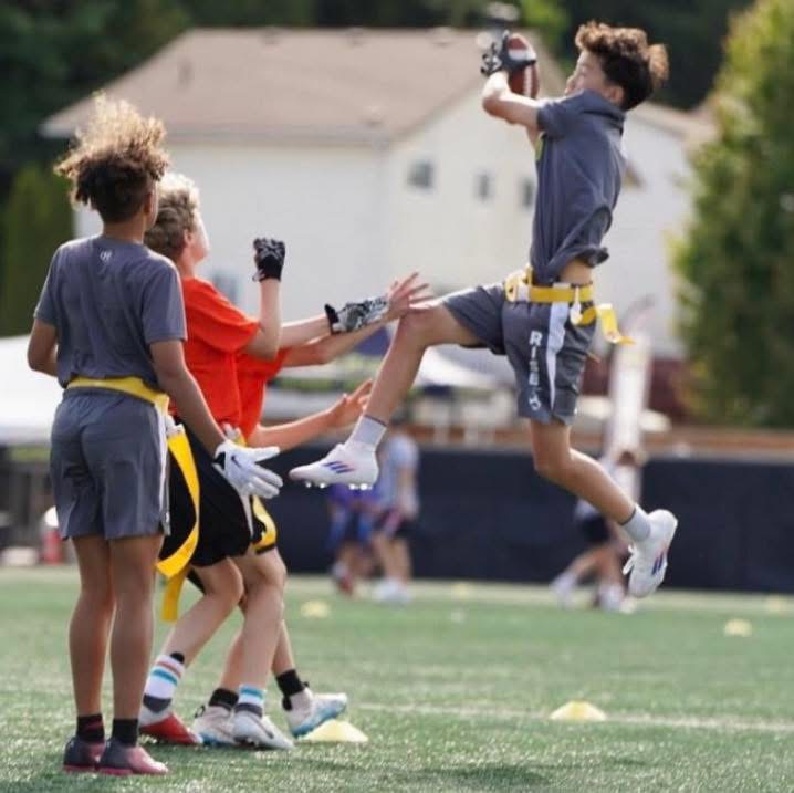 RISE player going up for a catch